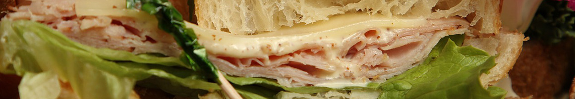 Eating Sandwich at Higgins Beach Market.